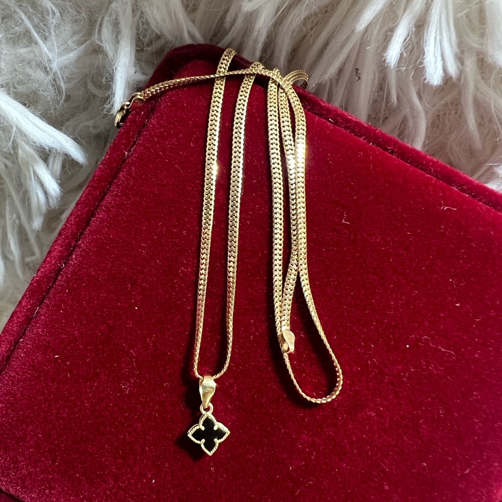 Elegant Gold Pendant with onyx stone chain isn’t included